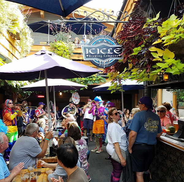 View of the München Haus beer garden with people eating.